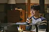 Kim Yong comes across a magical ham radio which connects him to Mo-nee, portrayed by Cho Yi-hyun, who is a college sophomore living in the year 2022. [CJ ENM]