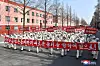 North Korean workers at a steel factory in Hwanghae Province, clad in full anti-epidemic gear, hold a state-sponsored rally on Monday to support the regime's new five-year economic plan, aimed at boosting production levels at such factories. The photo was published by state media. [YONHAP]