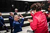 A BIE enquiry mission exchanges a high-five with a Busan citizen during a tour of a United Nations Memorial Cemetery in Korea, the world’s only United Nations cemetery to honor UN military causalities in the Korean War, in April. [YONHAP]