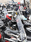 Delivery motorcycles parked at the Dongdaemun Shopping Complex, eastern Seoul, on Tuesday. According to the Ministry of Employment and Labor on Tuesday, quick-delivery-service bikers and designated drivers will be allowed to subscribe for employment insurance starting 2022. Companies running the ordering apps will be considered employers and pay half the 1.4-percent-of-income premium, while the bikers will pay the other half. It is part of the government's policy of getting all working people under employment insurance. These workers have been denied employment insurance as they are considered private contractors. [YONHAP]