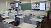 A teacher holds an online class with his students from an empty classroom at Yongmun Elementary School in Busan on Monday. From Monday, many elementary and secondary schools across the nation stopped in-person classes and resumed online classes instead, in accordance with the government’s renewed social distancing guidelines. [SONG BONG-GEUN]
