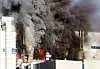 Black smoke rises from battery maker EcoPro BM's plant in Cheongju, North Chungcheong, on Friday. [YONHAP]