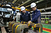 Hyundai Steel employees inspect 9-percent nickel thick plate. [HYUNDAI STEEL]