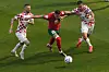 Croatia's Marcelo Brozovic, left, Morocco's Selim Amallah, Croatia's Dejan Lovren, vie for the ball during the World Cup group F soccer match between Morocco and Croatia at the Al Bayt Stadium in Al Khor, Qatar on Wednesday. [AP/YONHAP]