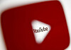 A 3D-printed YouTube icon is seen in front of a YouTube logo in this illustration taken October 25, 2017. [REUTERS/YONHAP]