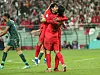 Lee Kang-in, left, celebrates with Cho Gue-sung after scoring his second goal for Korea during a friendly against Tunisia at Seoul World Cup Stadium in western Seoul on Friday. [YONHAP]
