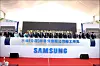 Representatives at Samsung Electronics and Chinese government officials celebrate the operation of a chip plant in 2014. [SAMSUNG ELECTRONICS]