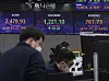 A screen in Hana Bank's trading room in central Seoul shows stock and foreign exchange markets open on Thursday. [NEWS1]