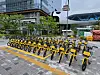 Kakao T bikes are parked in front of the Pangyo Station in Seongnam, Gyeonggi. [KAKAO MOBILITY]