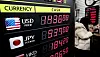The dollar-won exchange rate is displayed on a screen at a currency exchange in Myeong-dong, Jung District, central Seoul, on Jan. 28. [NEWS1]