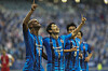 Ulsan Hyundai FC's Junior Negrao, left, and Kim In-Sung celebrate after a goal against Persepolis during the AFC Champions League final in Al Wakrah, Qatar on Dec. 19. (AP/YONHAP)