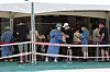 People wait in line at a Covid-19 testing site in Songpa District, southern Seoul on Sunday. [YONHAP]