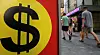 Pedestrians walk past a foreign exchange in Myeong-dong, central Seoul, on Tuesday. The local currency closed at 1,330.9 won against the dollar on Monday to finish above the 1,330 mark for the first time since May 18. The won is losing ground against the dollar over the worse-than-expected producer price index in the United States and the slowing Chinese economy. [NEWS1]
