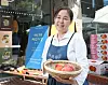 Lee Bo-eun, founder and executive director of Seoul's farmers' market Marche@ poses for a photo at one of Marche@'s markets in Mapo District, western Seoul, on Aug. 7. [PARK SANG-MOON]