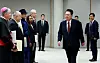 President Yoon Suk Yeol, right, receives the credentials of Archbishop Giovanni Gaspari, the 12th Apostolic Nuncio to South Korea, and 12 newly appointed foreign ambassadors at the Yongsan presidential office in central Seoul on Monday. The envoys were from Paraguay, Bahrain, Mongolia, Papua New Guinea, Sweden, Latvia, Uzbekistan, Belgium, South Africa, Finland, Argentina and Israel. [YONHAP]
