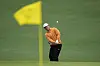Tom Kim, also known as Kim Joo-hyung, chips to the green on the second hole during the weather delayed third round of the Masters golf tournament at Augusta National Golf Club on Saturday in Augusta, Georgia. [AP/YONHAP]