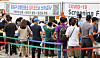People queue to be tested for Covid-19 at a testing center in Gangnam District, southern Seoul, on Tuesday. [YONHAP]