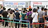 People queue to be tested for Covid-19 at a testing center in Gangnam District, southern Seoul, on Tuesday. [YONHAP]