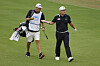 Im Sung-jae exchanges clubs with his caddie on the second hole during day three of the World Golf Championships-Dell Technologies Match Play at Austin Country Club on Friday in Austin, Texas.  [GETTY IMAGES]