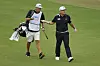 Im Sung-jae exchanges clubs with his caddie on the second hole during day three of the World Golf Championships-Dell Technologies Match Play at Austin Country Club on Friday in Austin, Texas. [GETTY IMAGES]