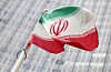 The Iranian flag flutters in front the International Atomic Energy Agency (IAEA) headquarters in Vienna, Austria July 10, 2019. [REUTERS/YONHAP]
