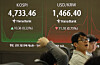 A screen in Hana Bank's trading room in central Seoul shows the Kospi opening on Jan. 15. [YONHAP]