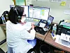 A doctor in Gangnam, southern Seoul, consults a Covid-19 patient through a video call in March, when virus cases peaked. [HANA ENT HOSPITAL]