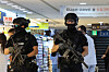 Armed police patrols Gangnam subway station on Sunday. [YONHAP]