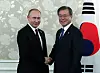 President Moon Jae-in and Russian President Vladimir Putin shake hands before their summit in Osaka on June 29, 2019 on the sidelines of the G20 Summit in Japan. [JOINT PRESS CORPS]