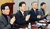 Democratic Party Chair Lee Jae-myung, second from right, attends a meeting at the National Assembly on Thursday. [YONHAP]