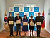 Nils Steen Egelien, president of the Norwegian Korean War Veterans Association, second from left, and Korean Ambassador to Norway Nam Young-sook pose during a ceremony to present the masks to Korean War veterans at the embassy in Oslo on June 15. [EMBASSY OF KOREA IN NORWAY]
