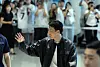 Son Heung-min waves to fans at Incheon International Airport in Incheon on Aug. 5. [NEWS1]
