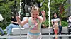 A girl splashes in a fountain in Gwanghwamun Square in central Seoul on Wednesday, which coincides with World Environment Day, as the midday temperature in the capital reached a high of 30 degrees Celsius (86 degrees Fahrenheit). [YONHAP]