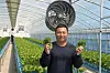 Gongjuae Cabbage CEO Choi Won-chang holds some cabbages. [RETURN2FARM]
