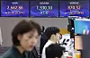 Screens in Hana Bank's trading room in central Seoul shows the stock market price as it opens on Monday. [YONHAP]