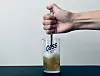 Some use a spoon to mix the soju and beer. [LEE SUN-MIN]