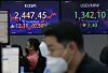 A screen in Hana Bank's trading room in central Seoul shows the Kospi closing at 2,447.45 points on Wednesday, up 12.11 points, or 0.5 percent, from the previous trading day. [NEWS1]