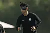 Korea's Son Heung-min warms up during Korea's official training on the eve of the group H World Cup football match between Korea and Portugal, at the Al Egla Training Site 5 in Doha, Qatar on Thursday. [AP/YONHAP]