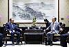 Former Korean Prime Minister Lee Hae-chan, left, holds a meeting with Chinese Foreign Minister Wang Yi on the sidelines of a conference in Beijing Saturday, in a photo provided by the Chinese Foreign Ministry. [YONHAP]