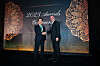 Kyobo Life Insurance Chairman Shin Chang-jae, left, shakes hands with Josh Landau, president of the International Insurance Society, after Shin accepts the reward as the 2023 Insurance Hall of Fame Laureate in Singapore on Monday. [KYOBO LIFE INSURANCE]