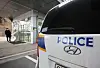 A police car is parked outside Ajou University Hospital in Suwon, Gyeonggi, where Hwacheon Daeyu owner Kim Man-bae is receiving treatment after stabbing himself on Wednesday. [YONHAP]