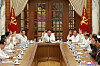 North Korean leader Kim Jong-un, center, convenes a Politburo meeting of the North's ruling Workers' Party Central Committee to discuss preparations for Typhoon Bavi, which is expected to make landfall in the country late Wednesday evening. [YONHAP]