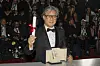 Director Park Chan-wook poses for the Award Winners' photocall at the 75th annual Cannes Film Festival after winning the Best Director Award for his film 'Decision to Leave.' [AP/YONHAP]