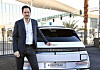 Karl Iagnemma, President and CEO of Motional, poses with Ioniq 5-based robotaxi on Jan. 6 at CES 2022 in Las Vegas. [HYUNDAI MOTOR]