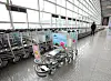 Baggage carts stand empty at a passenger terminal in Incheon International Airport on Wednesday. Despite expectations that the travel industry would begin to recover as inoculations increase, the increasing number of Covid-19 cases is expected to again stall overseas travel. [NEWS1]