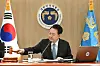 President Yoon Suk Yeol presides over a Cabinet meeting at the Yongsan presidential office in central Seoul on Tuesday. He granted special pardons to key political and business figures ahead of the Lunar New Year holiday. [JOINT PRESS CORPS]
