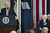 Former U.S. President Joe Biden, right, watches as U.S. President Donald Trump speaks after taking the oath of office at the 60th Presidential Inauguration in the Rotunda of the U.S. Capitol in Washington, Jan. 20. [AP/YONHAP]