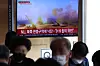 A news report on North Korea's firing of artillery shots into maritime buffer zones being aired on television is shown at Seoul Station in central Seoul on Oct. 14. [YONHAP]