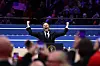 Tesla CEO Elon Musk gestures on stage as he prepares to speak inside the Capital One arena on the inauguration day of Donald Trump's second Presidential term, in Washington, Jan. 20. [REUTERS/YONHAP]