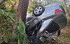 The car in which three people died and two were injured is seen on a slope in Namhae County, South Gyeongsang, on Tuesday. [GYEONGSANGNAM-DO FIRE DEPARTMENT]